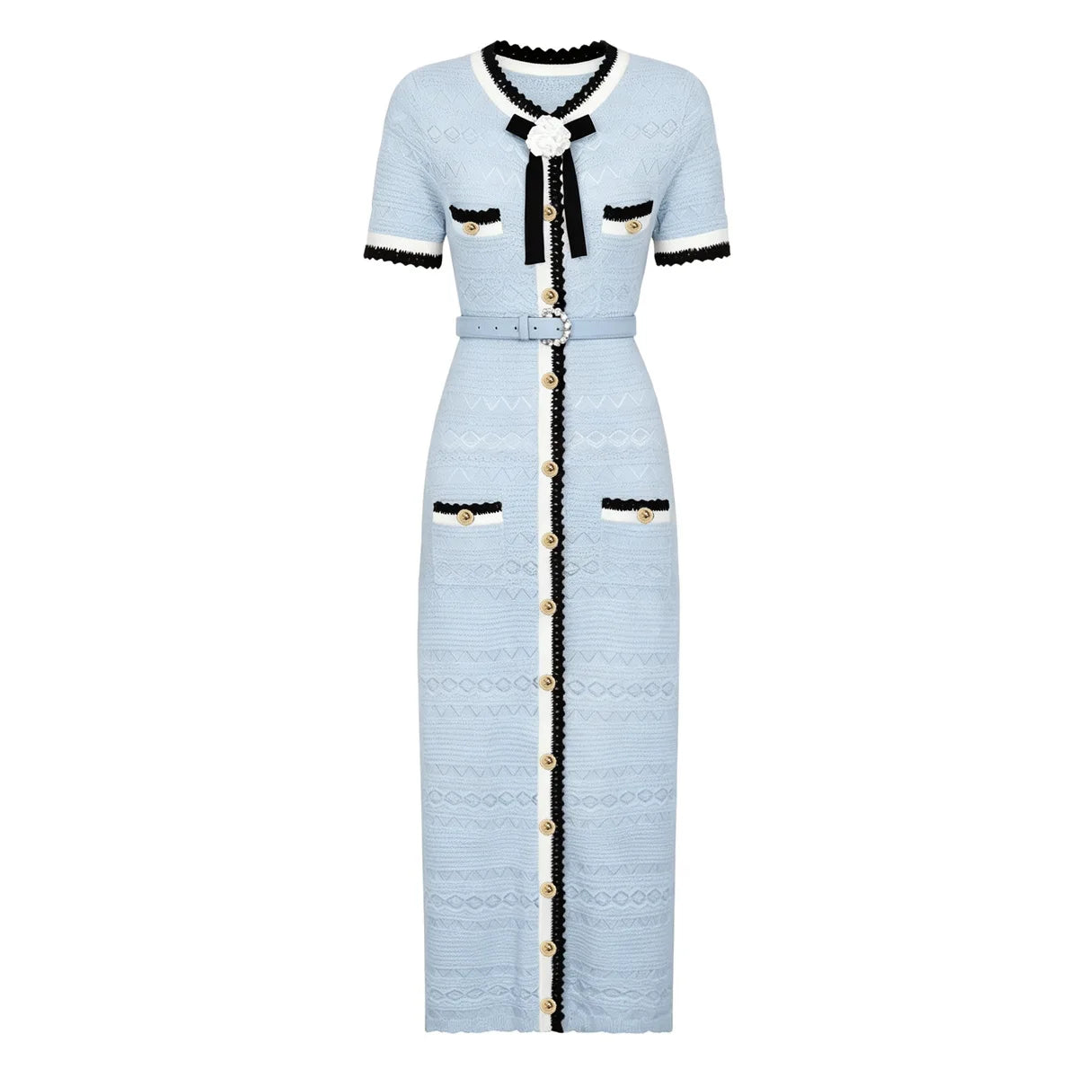A light blue textured tweed midi dress with black and white trim, featuring a black bow at the collar, gold-tone buttons down the front, and flap pockets with black trim.