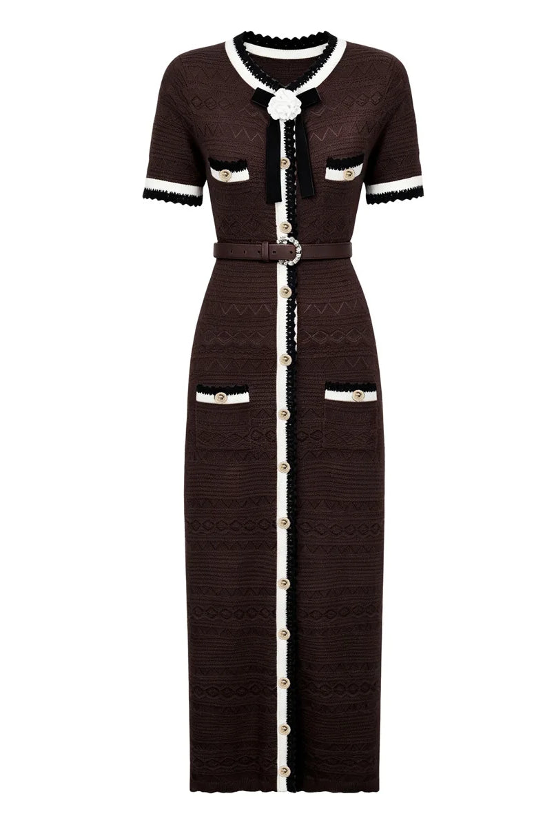 A dark brown textured knit midi dress with short sleeves, featuring white and black trim, gold-tone buttons, and a matching belt with a gold buckle.