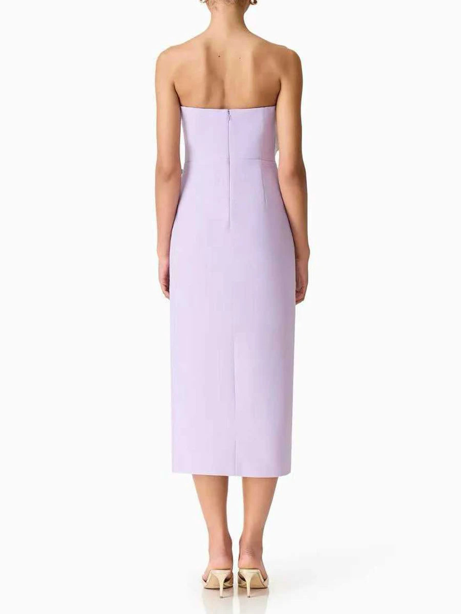 Lavender strapless dress worn by a model on a white background