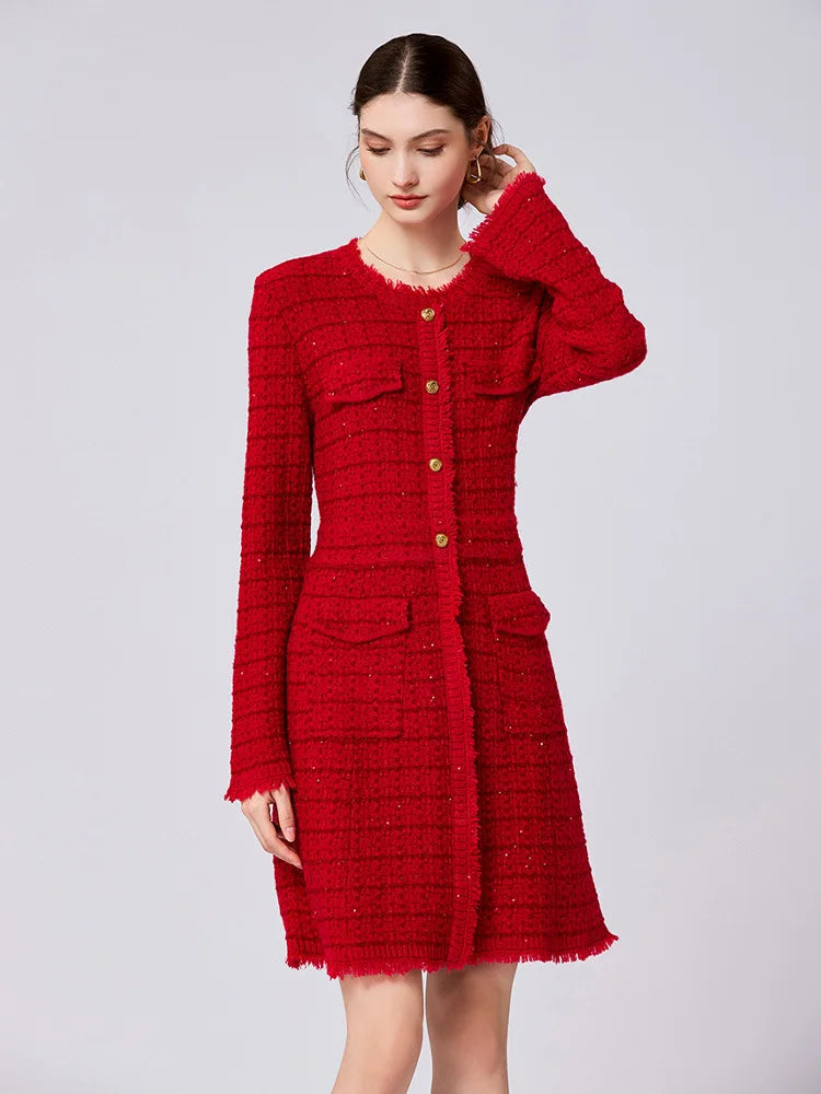 A woman models a red tweed mini dress with gold buttons and frayed edges against a light gray studio background.