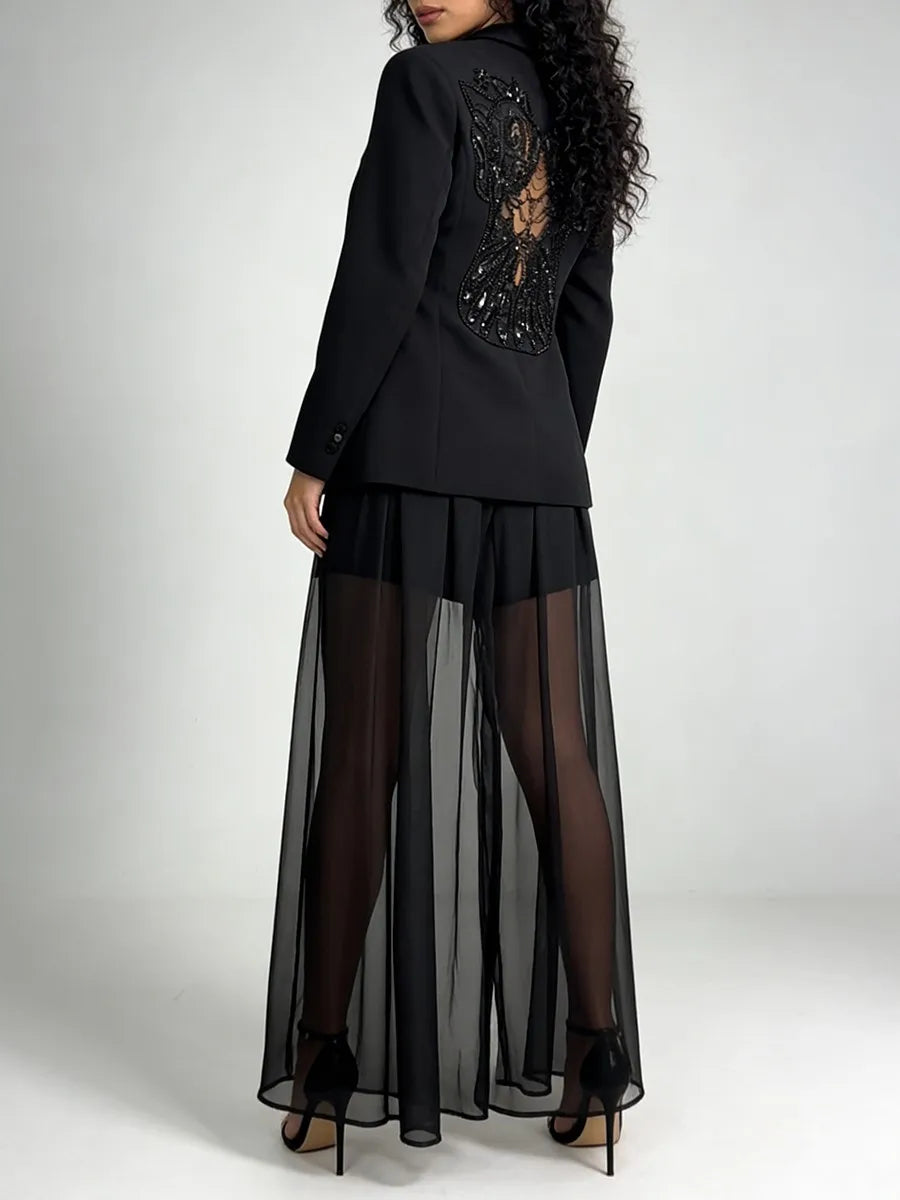 Back view of open-back crystal beaded blazer